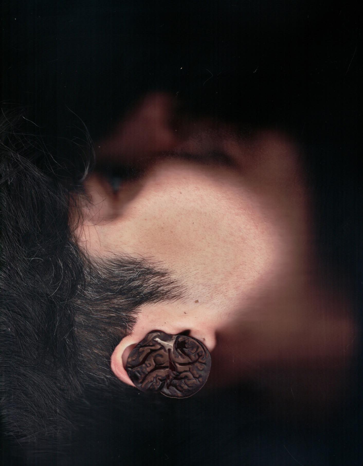 Close-up of ear with wood ear fungus