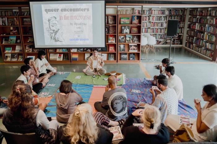 Hands interacting with various mushroom specimens and fungi samples